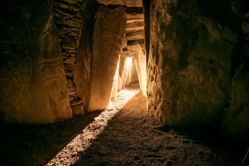Sunlight entering the burial chamber at Newgrange in County Meath around the winter solstice.