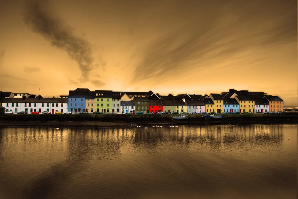 Colorful houses in Galway, Ireland on the banks of the River Corrib.
