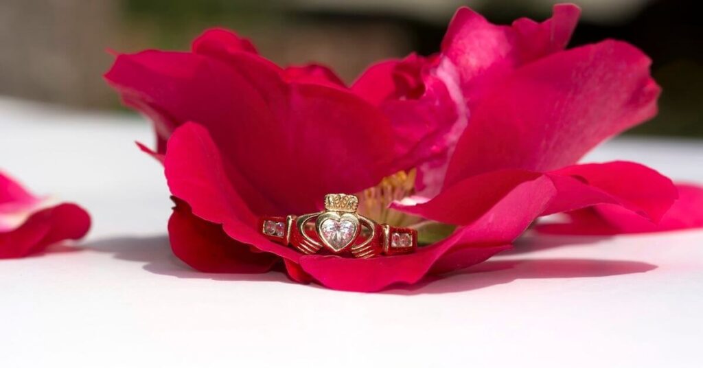 Gold Claddagh Ring with precious stone in the heart.