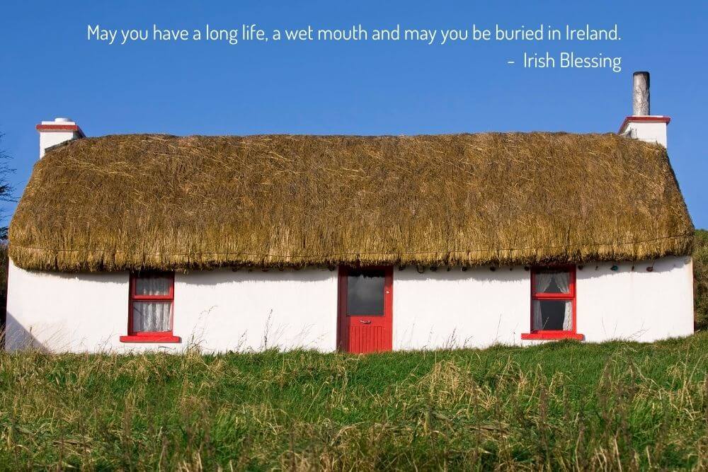 A tatched cottage in Ireland with a blessing