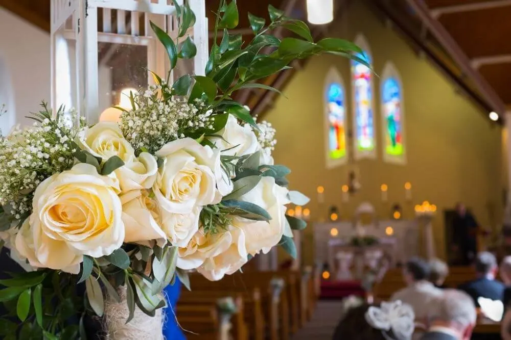 Wedding flowers in a church.