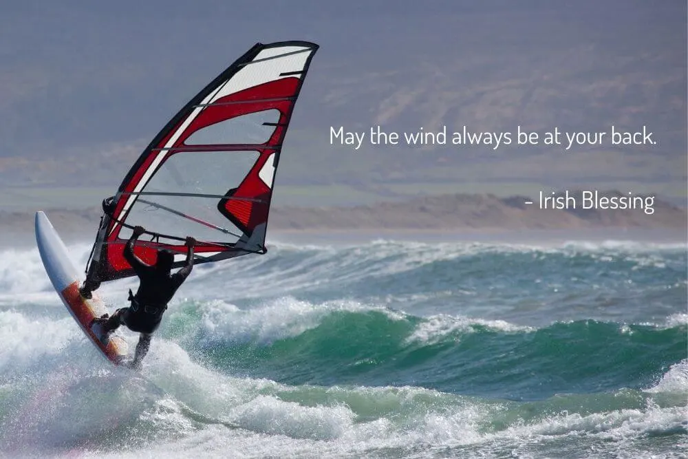 A windsurfer riding the waves.