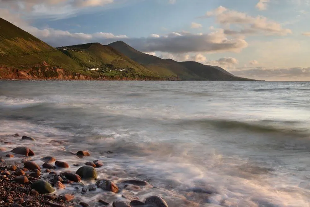 Rossbeigh Beach with the R564 just about visible on the mountain in the background. 