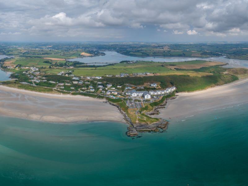 Aerial view of Inchydoney West beach and Inchydoney East Beach with the headland separating the two beaches in between.  