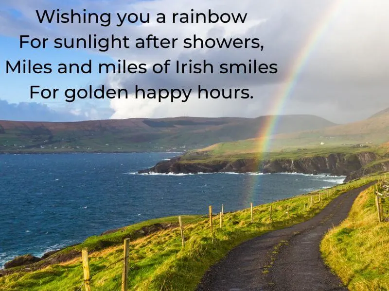 County coastal road in Ireland with a rainbow. 