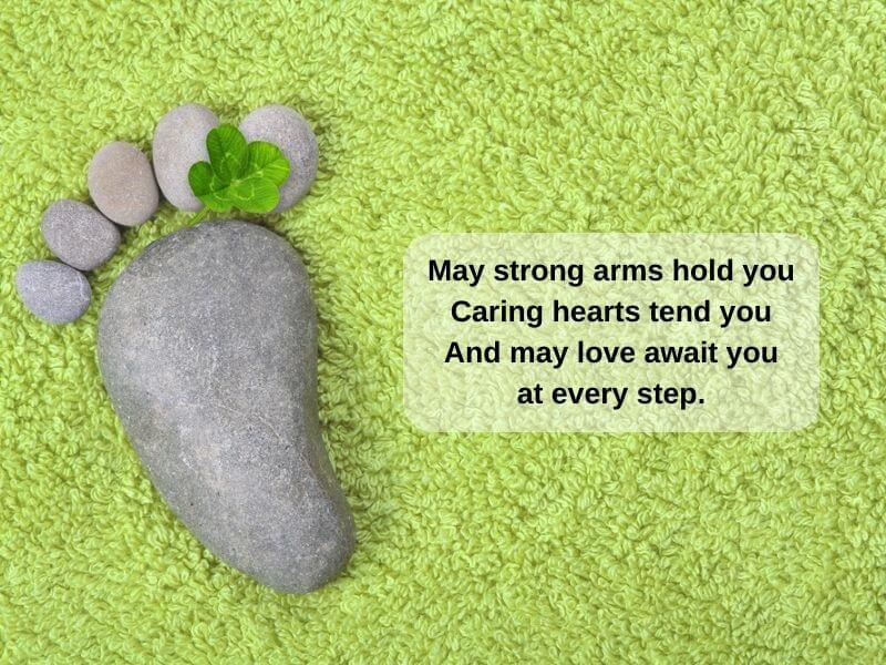 An Irish Blessing text with a footprint image made of pebbles.