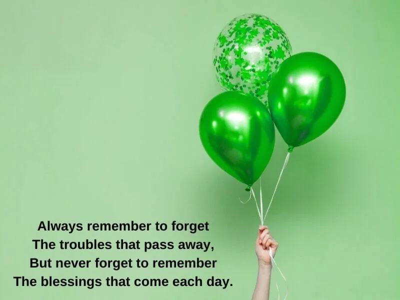 Green balloons with an Irish Blessing text.
