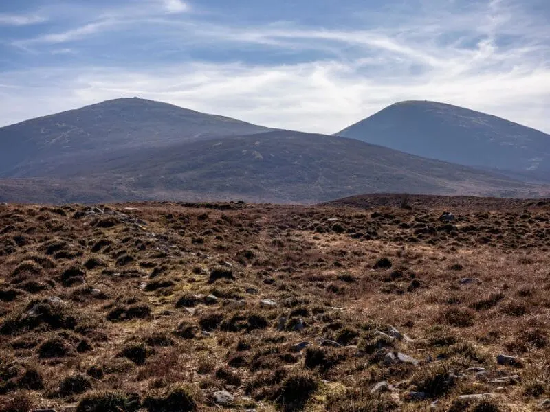 The rounded hills known as the Paps of Anu in County Kerry, Ireland.