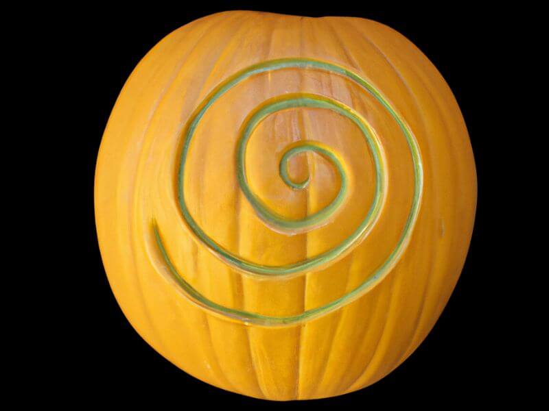 A pumpkin with a Celitc spiral design. 