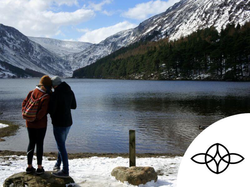 Serch Bythol Celtic Knot with two people by a Glendalough Lake. 