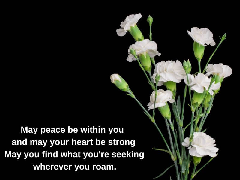 White carnations with an Irish Blessing for strength. 