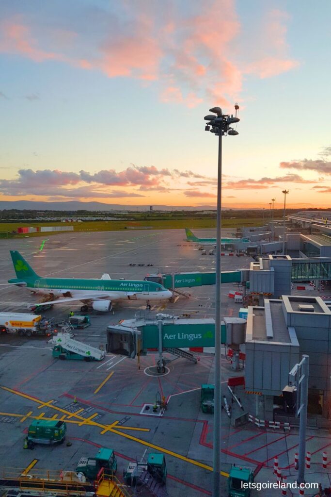 Aer Lingus plane with shamrock logo at Dublin Airport.